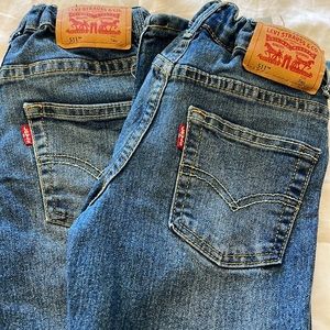 Two pairs of kids Levi’s 511 jeans size 7 regular